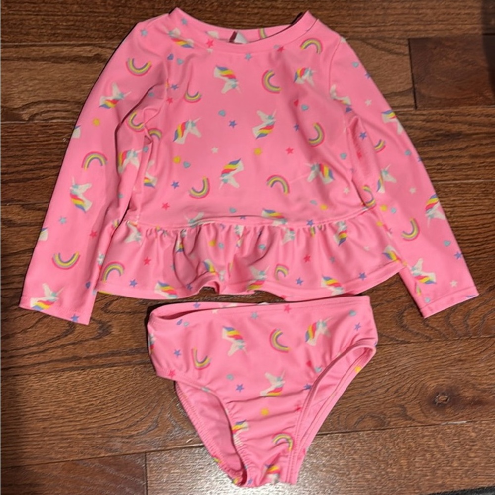 Unicorn and rainbows two piece Rashguard swim suit. Toddler size 2.